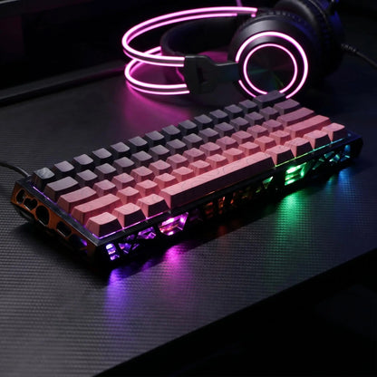 Translucent Black and Pink Gasket Mounted Mechanical Keyboard with RGB Lighting, Hot-Swappable Red Switches, N-Key Rollover, and USB-C Connectivity for Custom Gaming Setup on PC/Mac